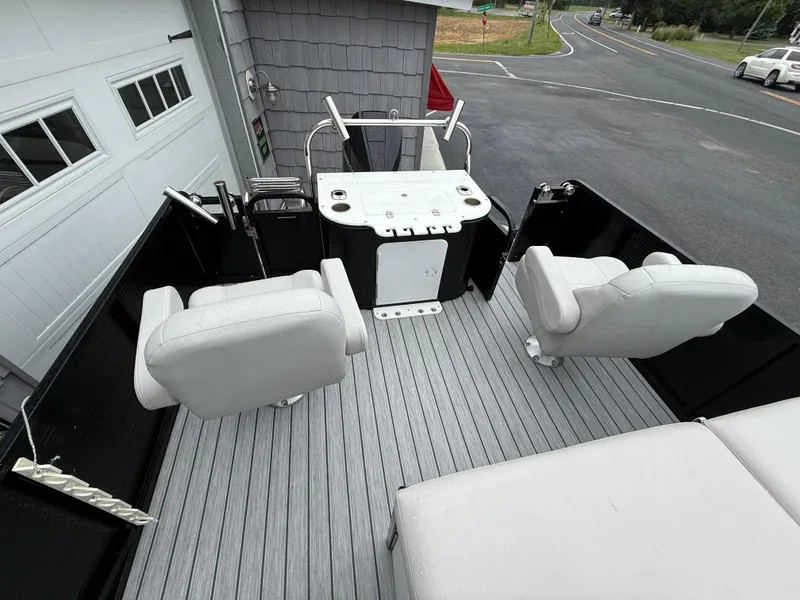 Slide: The Image of 2020 Avalon 2585 Catalina Rear Fish Tri-toon boat with high-performance seating and fishing setup. - 11