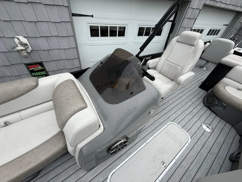 Slide: The Image of 2020 Avalon 2585 Catalina Tri-toon boat interior with plush seating and sleek design. - 16