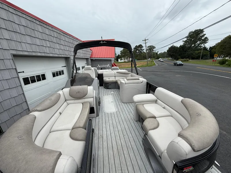 Slide: The Image of 2020 Avalon 2585 Catalina Tri-toon boat with spacious seating and sleek design. - 24