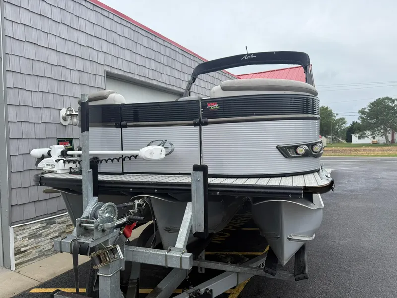 Slide: The Image of 2020 Avalon 2585 Catalina Rear Fish Tri-toon boat on trailer, parked outside. - 4