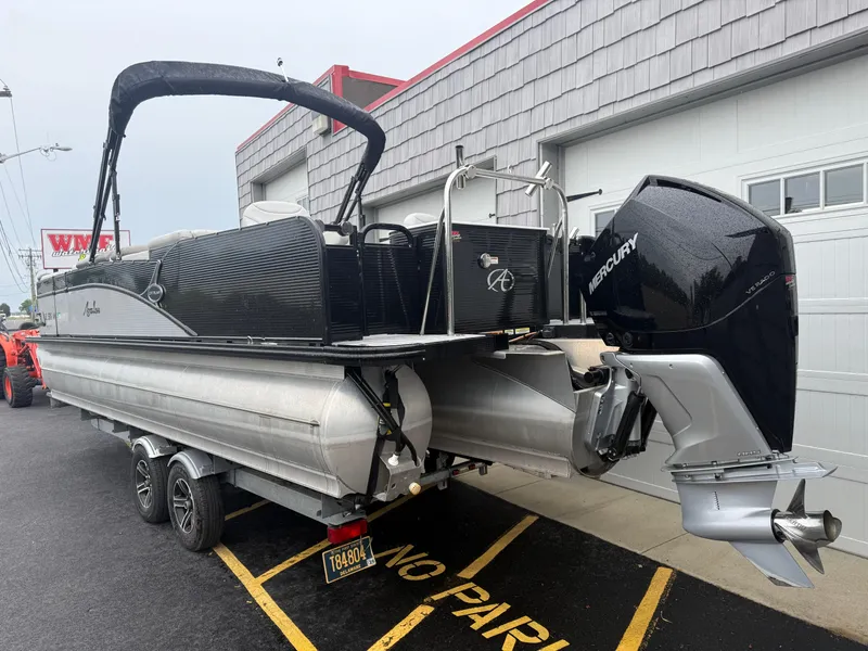 Slide: The Image of 2020 Avalon 2585 Catalina Tri-toon boat with Mercury engine on trailer. - 5