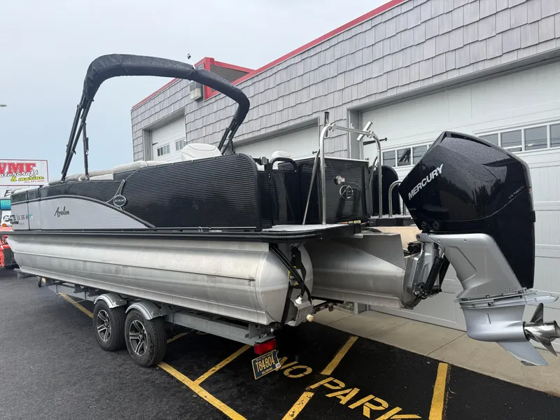 Slide: The Image of 2020 Avalon 2585 Catalina Tri-toon boat with Mercury engine on trailer. - 6