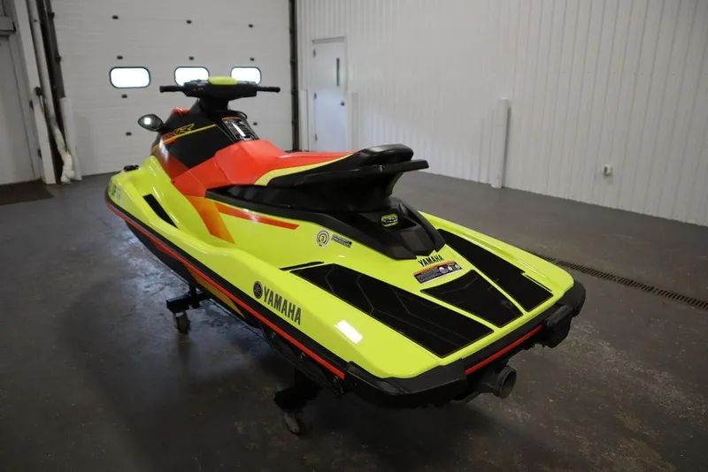 Slide: The Image of 2021 Yamaha WaveRunner EXR® in a garage, vibrant yellow and black design. - 16