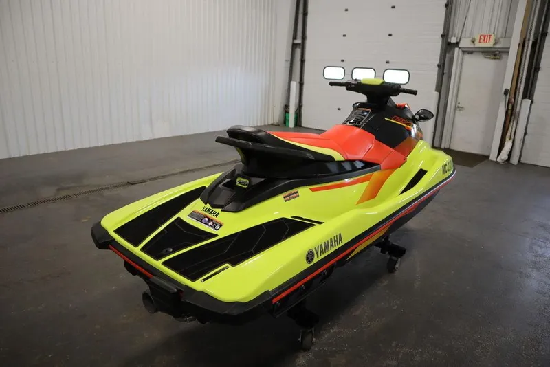 Slide: The Image of 2021 Yamaha WaveRunner EXR® in a garage, vibrant yellow and orange design. - 17