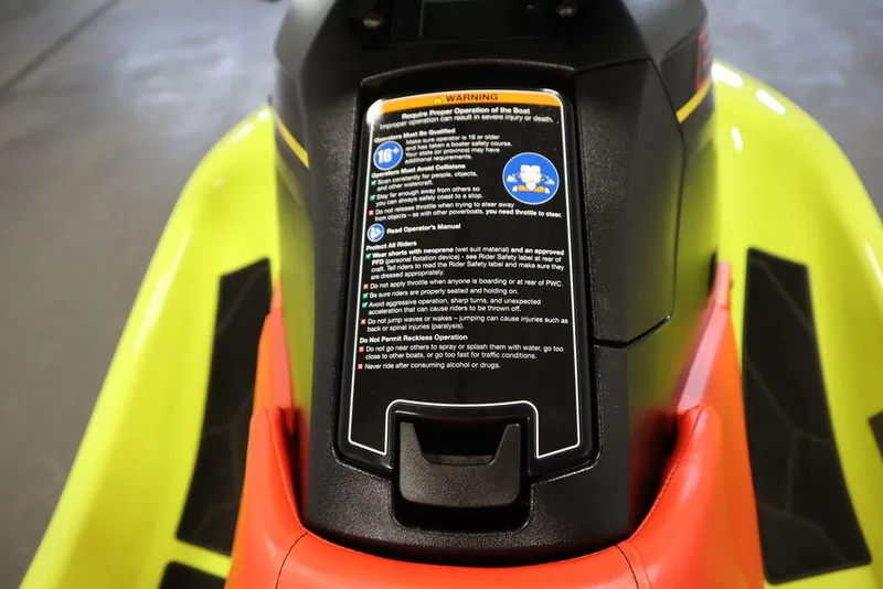 Slide: The Image of 2021 Yamaha WaveRunner EXR® dashboard with safety instructions and vibrant yellow-red design. - 5