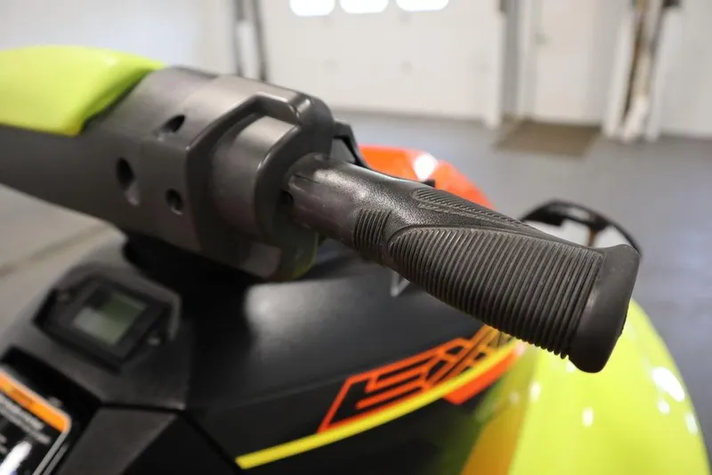 Slide: The Image of 2021 Yamaha WaveRunner EXR® handlebar close-up in a garage setting. - 6