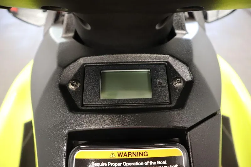 Slide: The Image of 2021 Yamaha WaveRunner EXR® dashboard with digital display and warning label. - 7
