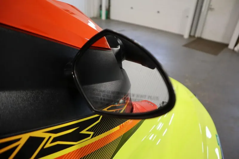 Slide: The Image of 2021 Yamaha WaveRunner EXR® side mirror, vibrant colors, indoor setting. - 8