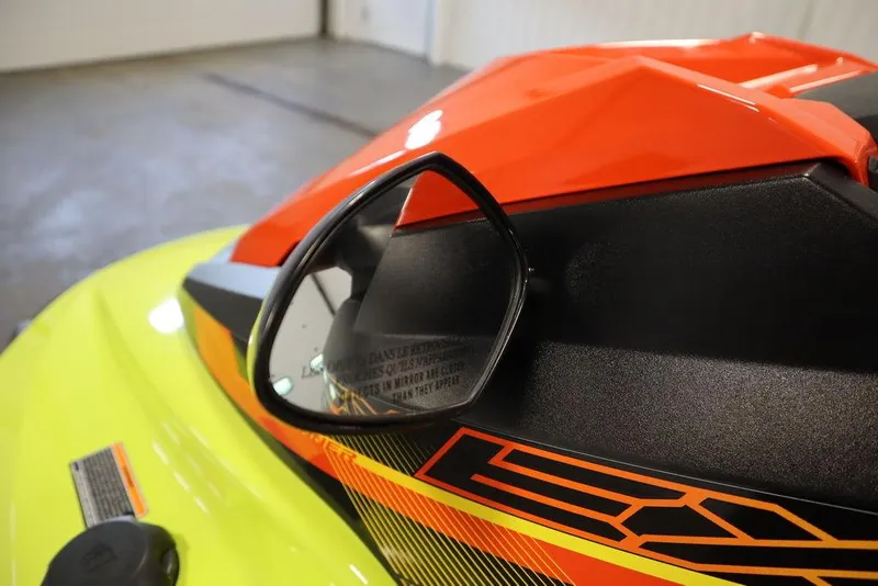 Slide: The Image of 2021 Yamaha WaveRunner EXR® close-up, showcasing vibrant design and side mirror detail. - 9