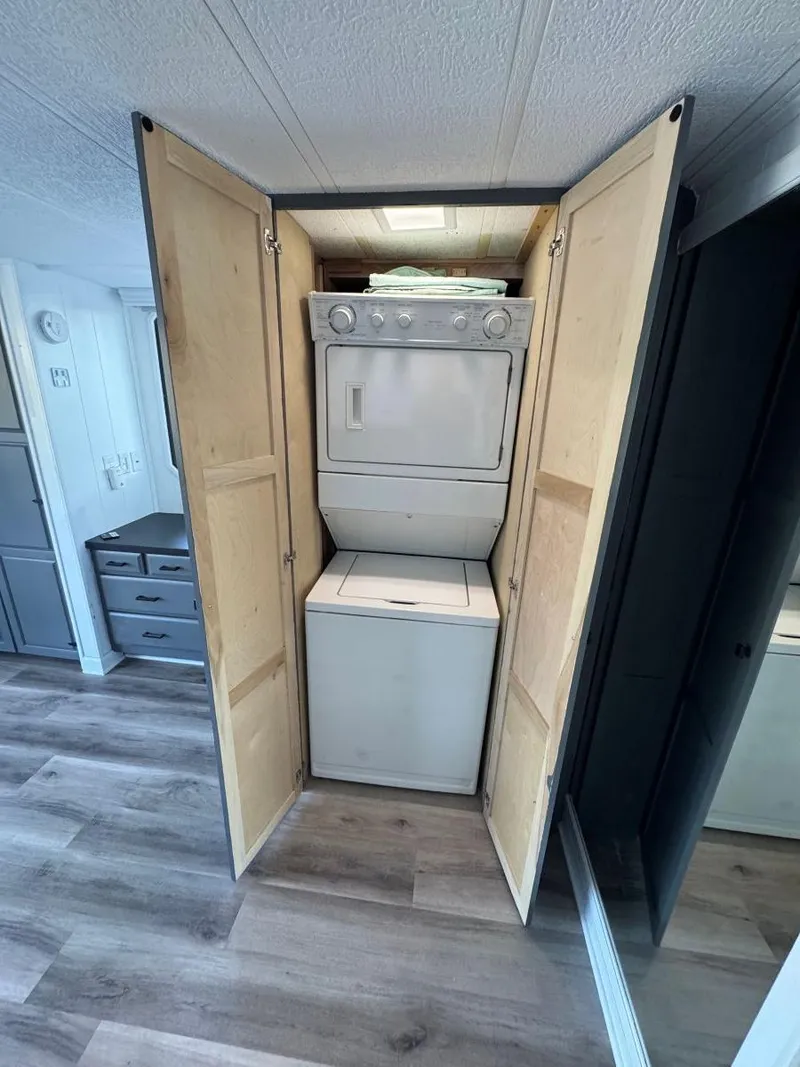 Slide: The Image of Stacked washer and dryer in 1986 Stardust Cruisers 18 X 80 houseboat interior. - 38