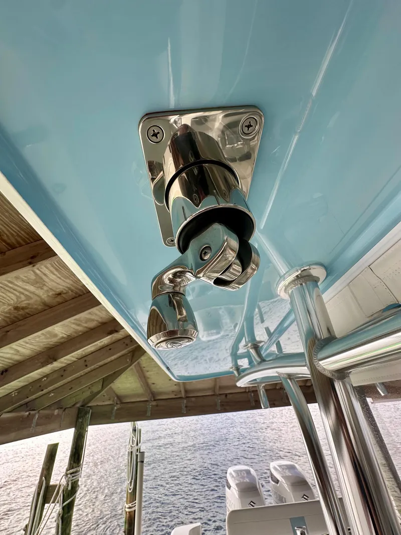 Slide: The Image of Close-up of a 2021 Albury Brothers 27 boat detail under a dock. - 18