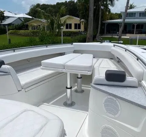 Slide: The Image of Luxurious 2019 HCB 53 Sueños boat interior with white seating and table. - 5