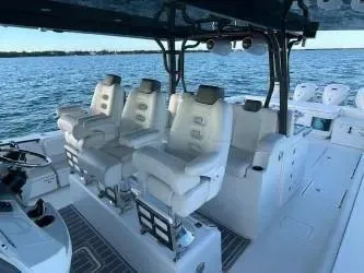 Slide: The Image of 2019 HCB 53 Sueños boat interior with luxurious seating on open water. - 8