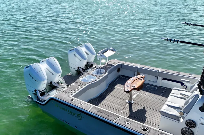 Slide: The Image of Freeman 47 boat with dual Mercury engines on clear water, 2021 model. - 13