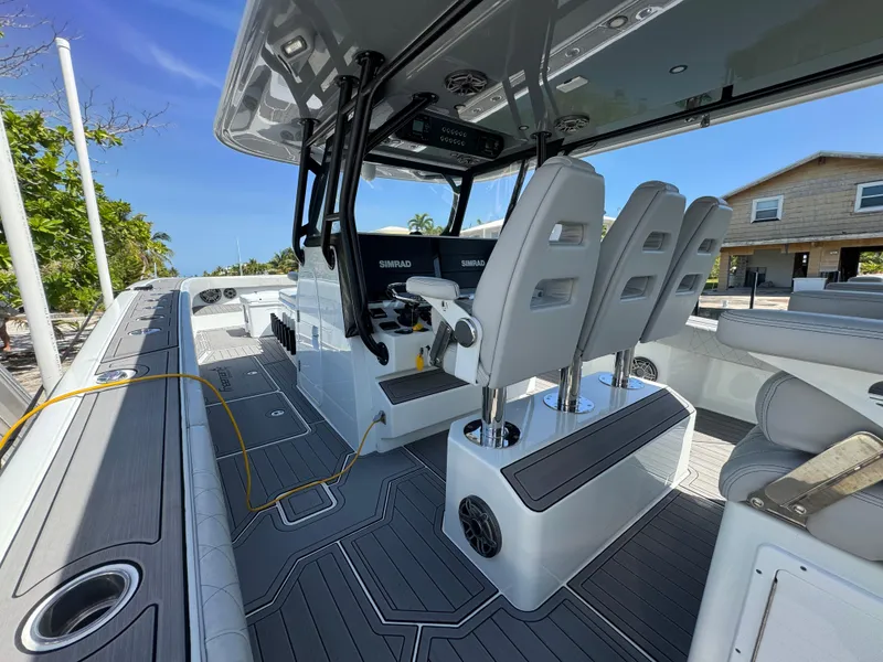Slide: The Image of Interior of a 2021 Freeman 47 boat with modern seating and navigation equipment. - 20