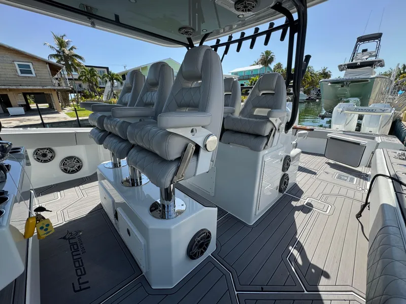 Slide: The Image of Luxurious interior of a 2021 Freeman 47 boat with plush seating and modern design. - 22
