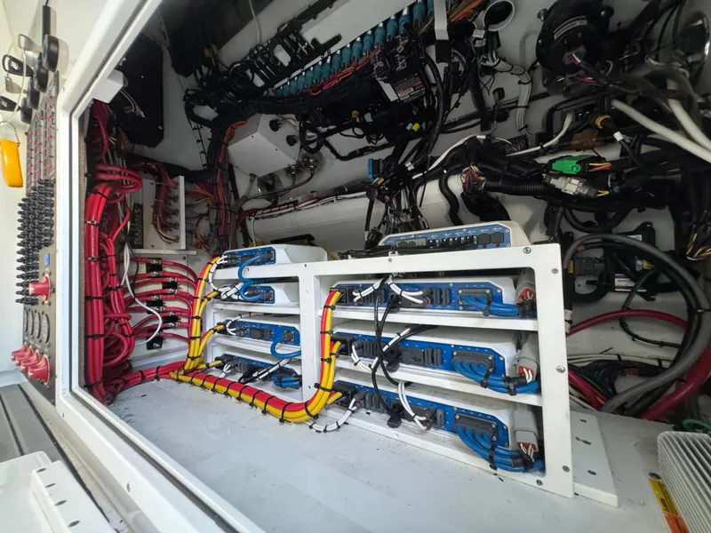 Slide: The Image of Electrical system inside a 2021 Freeman 47 boat, showcasing organized wiring and components. - 33