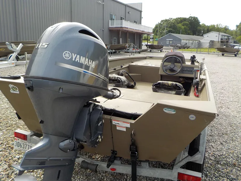 Slide: The Image of 2021 G3 20 SC boat with Yamaha 115 engine, parked on gravel near a building. - 15