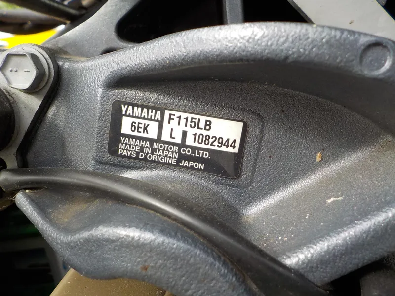 Slide: The Image of Close-up of Yamaha F115LB engine label on a 2021 G3 20 SC boat. - 18