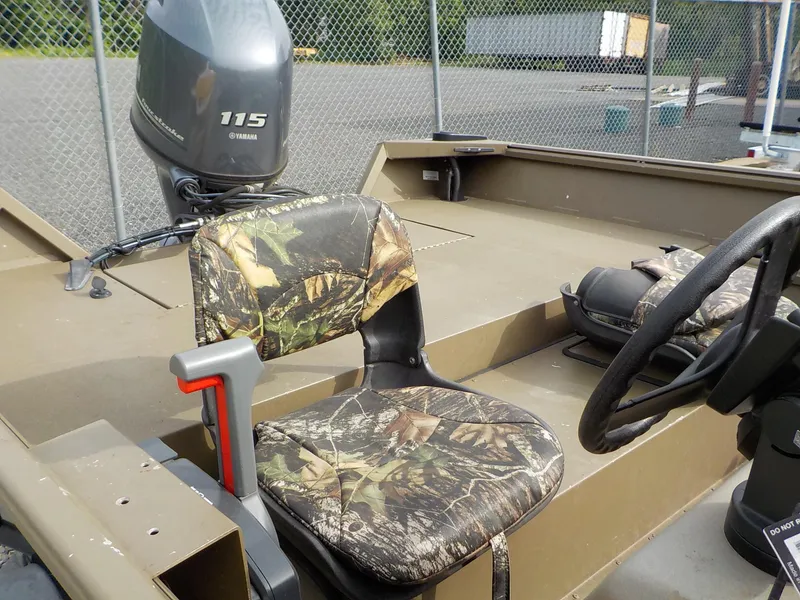 Slide: The Image of 2021 G3 20 SC boat with camo seats and Yamaha 115 outboard motor. - 19