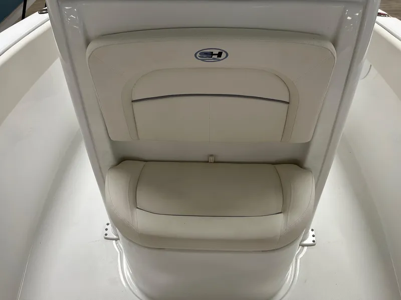 Slide: The Image of 2025 Sea Hunt Ultra 245 SE boat seat, white upholstery, sleek design. - 7