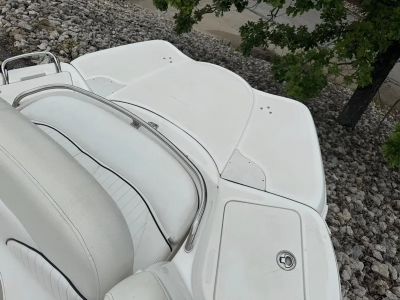 Slide: The Image of Rear view of a 2012 Azure AZ298 boat with white seating and deck. - 13