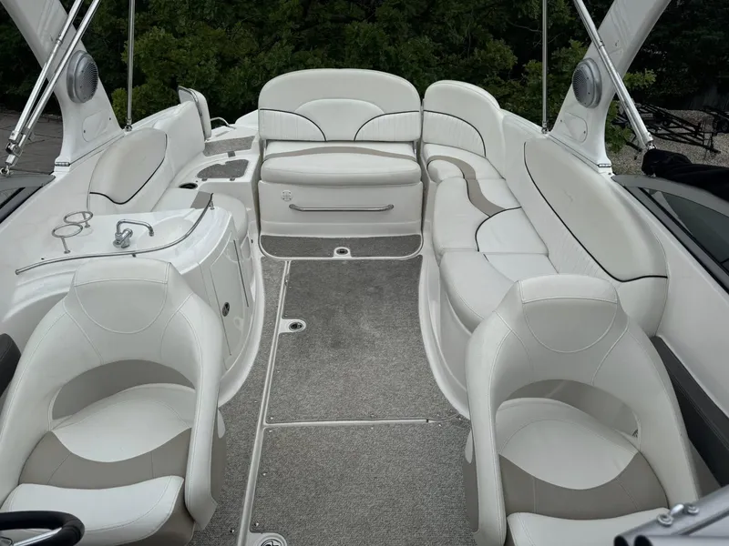 Slide: The Image of Luxurious interior of 2012 Azure AZ298 boat with white seating and carpeted floor. - 16