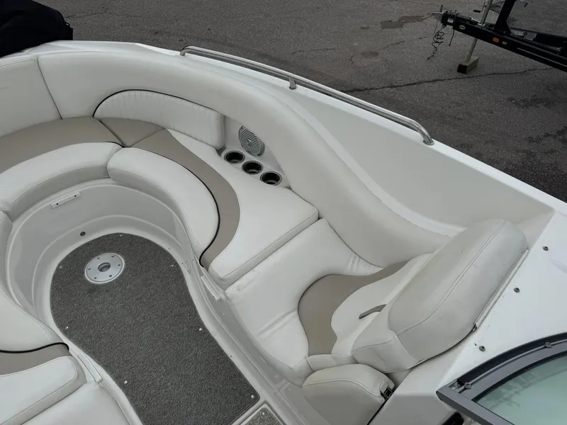 Slide: The Image of Interior of a 2012 Azure AZ298 boat with white and beige seating. - 19