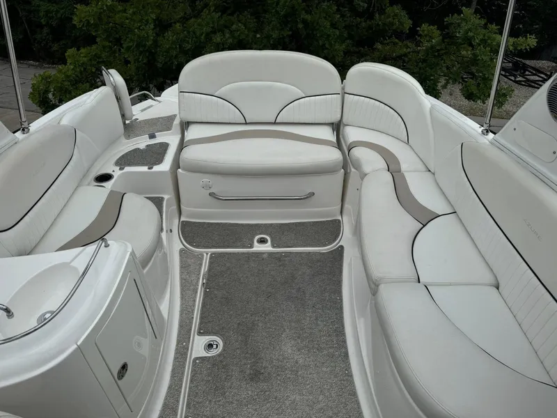 Slide: The Image of Luxurious 2012 Azure AZ298 boat interior with white seating and carpeted flooring. - 23