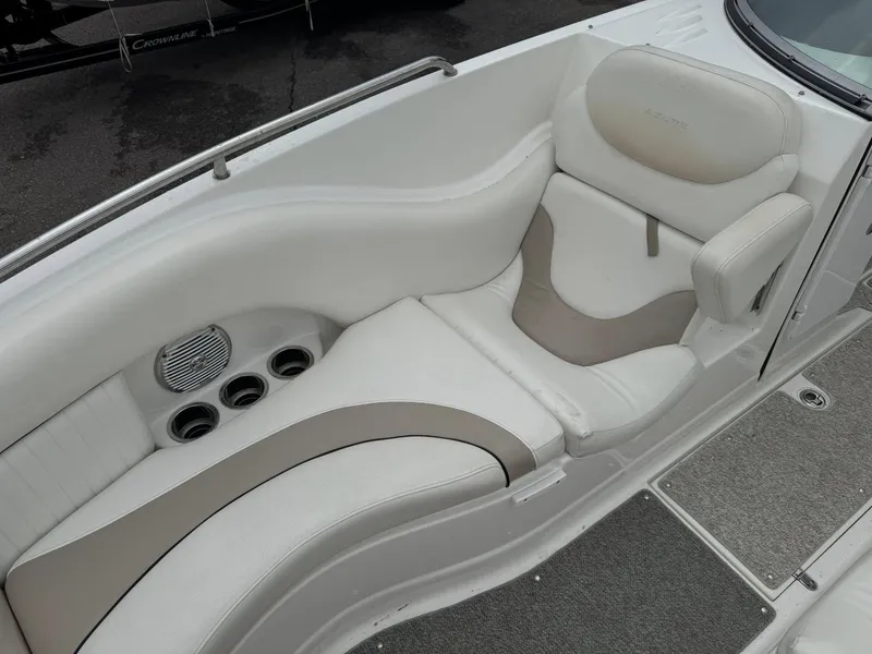 Slide: The Image of Luxurious seating on a 2012 Azure AZ298 boat with cup holders and speaker. - 26