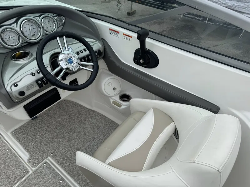 Slide: The Image of Steering console of 2012 Azure AZ298 boat with gauges and controls. - 27