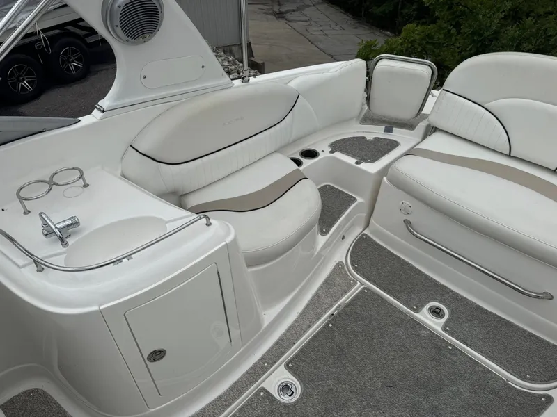 Slide: The Image of Luxurious interior of 2012 Azure AZ298 boat with white seating and carpeted flooring. - 3