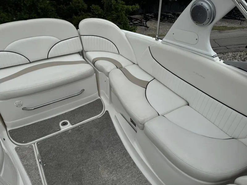 Slide: The Image of Luxurious seating area on a 2012 Azure AZ298 boat with white upholstery. - 8
