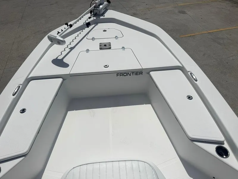 Slide: The Image of Bow of a 2018 Frontier 2104 boat with storage compartments and trolling motor. - 15