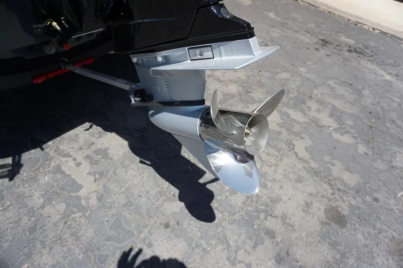 Slide: The Image of Propeller of 2025 Ranger RT198P boat on textured pavement background. - 8