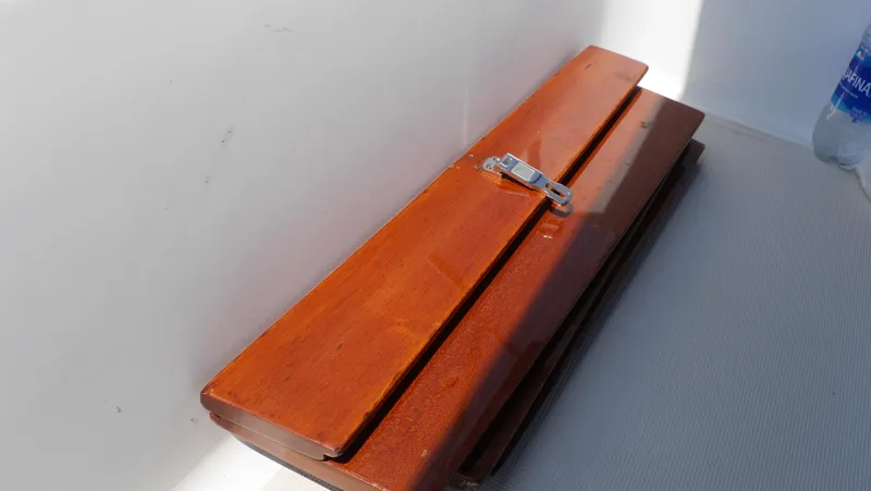 Slide: The Image of Wooden hatch cover on 1986 Ericson 35 MKIII sailboat deck. - 17