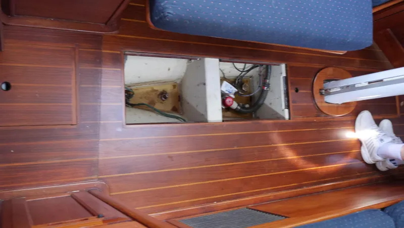 Slide: The Image of Interior view of 1986 Ericson 35 MKIII sailboat with open floor panel. - 39