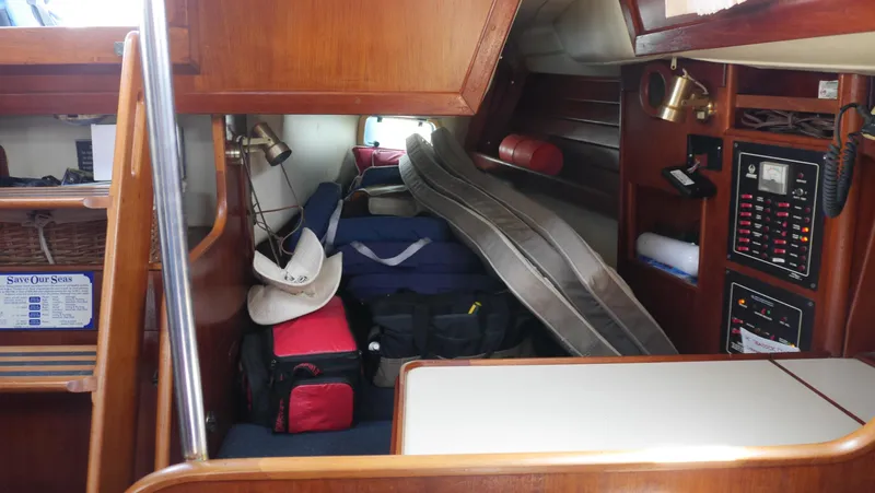 Slide: The Image of Interior of 1986 Ericson 35 MKIII sailboat with storage and navigation equipment. - 40