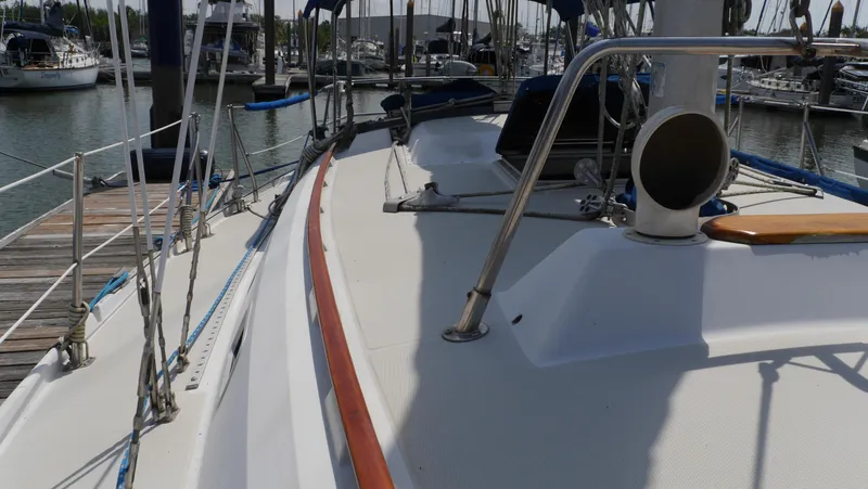 Slide: The Image of 1986 Ericson 35 MKIII sailboat deck view at marina. - 5