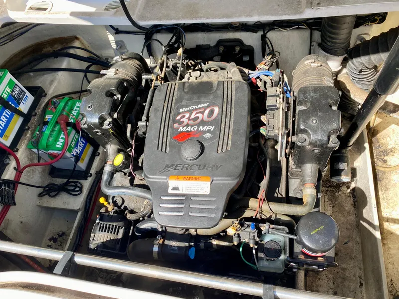 Slide: The Image of 2005 Four Winns 234 Funship engine compartment with MerCruiser 350 MAG MPI engine. - 17