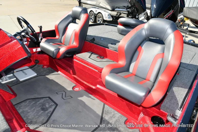 Slide: The Image of Red and gray interior of 2025 Nitro Z20 XL Pro boat with sporty seats. - 15