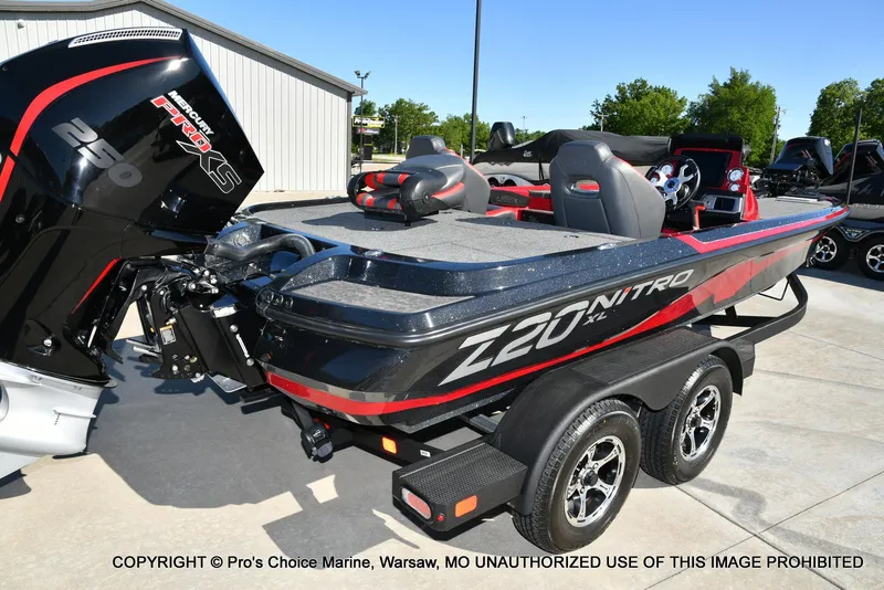 Slide: The Image of 2025 Nitro Z20 XL Pro boat with Mercury Pro XS engine on trailer. - 17