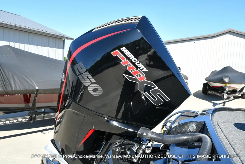 Slide: The Image of 2025 Nitro Z20 XL Pro with Mercury 250 Pro XS engine in a marina setting. - 20