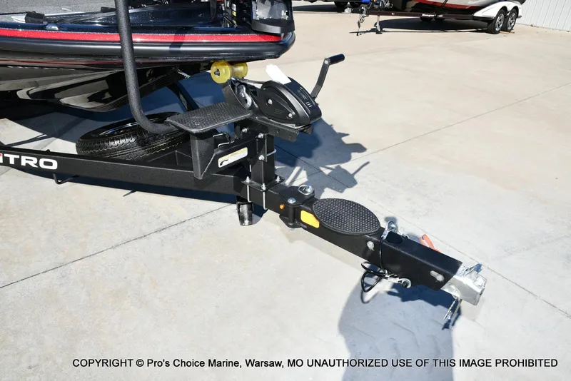 Slide: The Image of Trailer hitch of a 2025 Nitro Z20 XL Pro boat on concrete surface. - 31