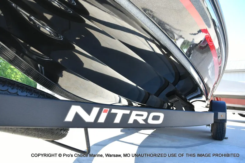 Slide: The Image of 2025 Nitro Z20 XL Pro boat on trailer, close-up view. - 33