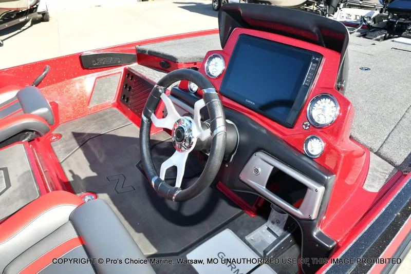 Slide: The Image of 2025 Nitro Z20 XL Pro boat interior with steering wheel and dashboard display. - 38