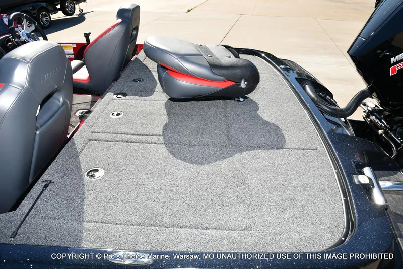 Slide: The Image of 2025 Nitro Z20 XL Pro boat interior with gray carpet and seating. - 40