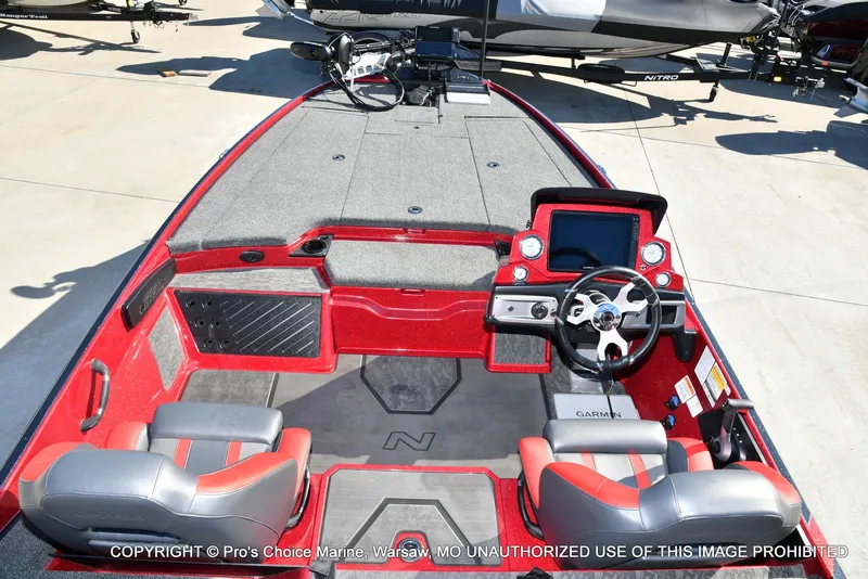 Slide: The Image of 2025 Nitro Z20 XL Pro boat interior with steering wheel and Garmin display. - 41