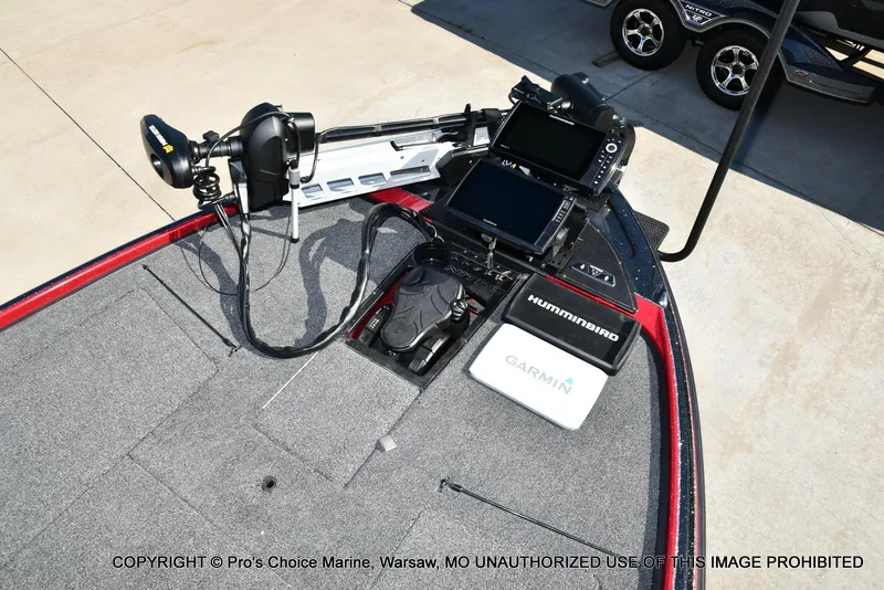 Slide: The Image of Fishing boat deck with advanced electronics, featuring Garmin and Humminbird systems on a 2025 Nitro Z20 XL Pro. - 49