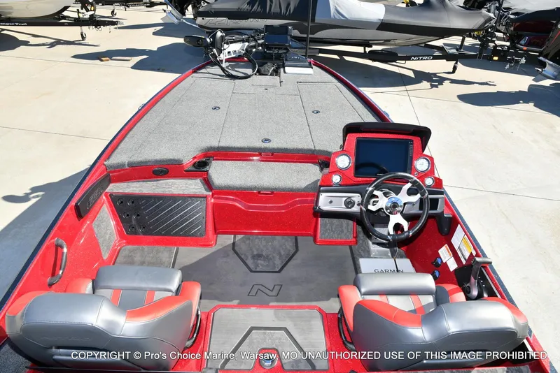 Slide: The Image of 2025 Nitro Z20 XL Pro boat interior with modern dashboard and seating. - 8